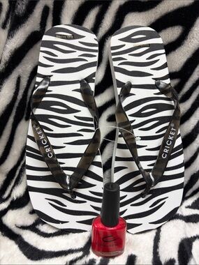 Cricket® Zebra-Print Flip Flops in Black and White